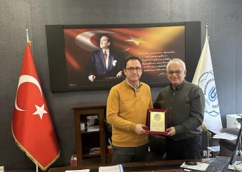 Assoc. Prof., whose term as Deputy Dean ended. Dr. Thank You Plaque to Ufuk ÇELİK